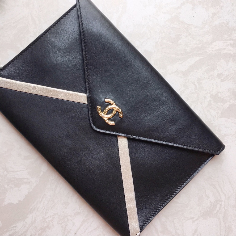 Chanel lamb skin leather black clutch